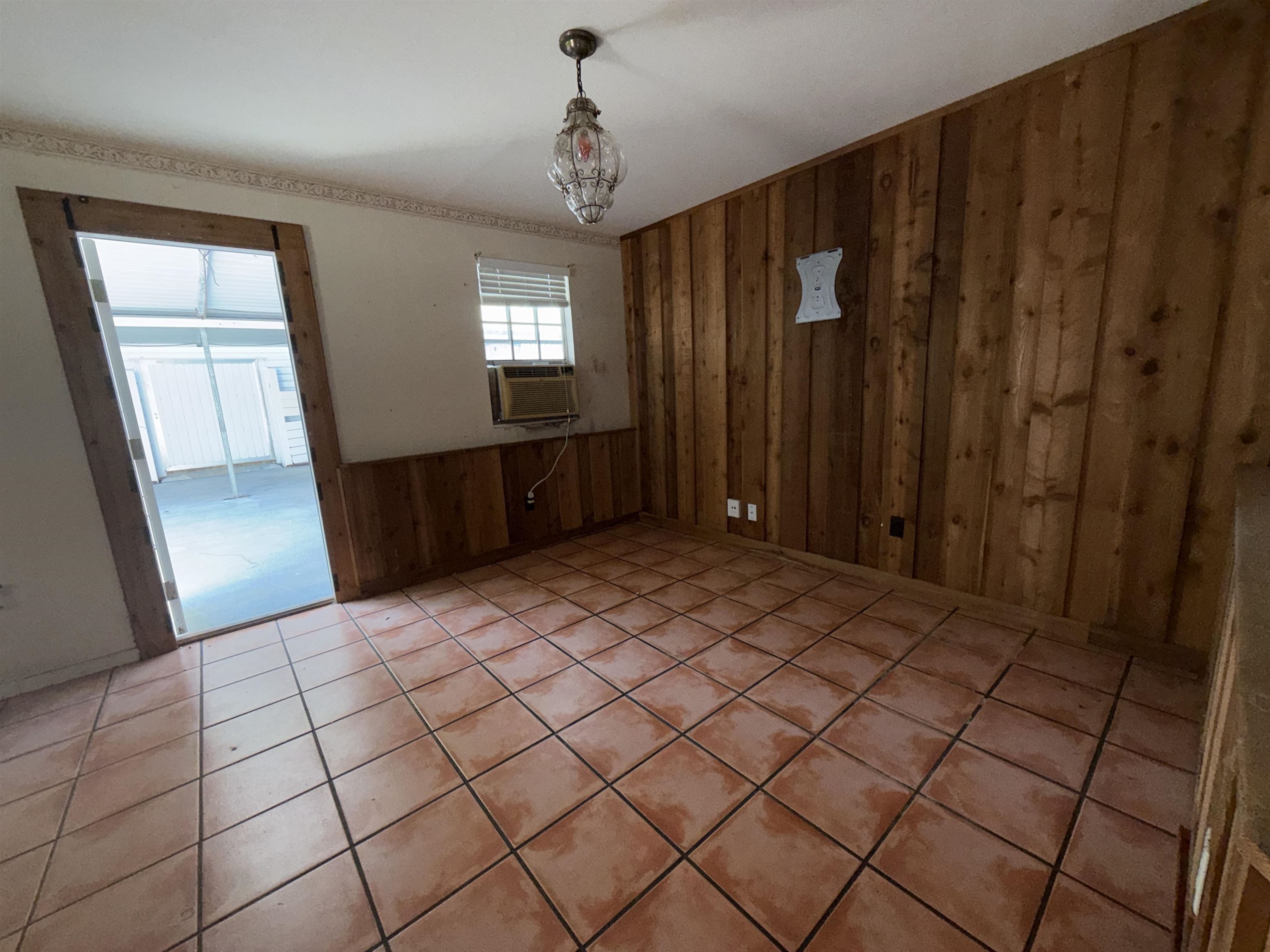 211 Cedar Creek Road Palatka, FL 32177 - Photo 15 of 24 a view of entryway with window and wooden floor