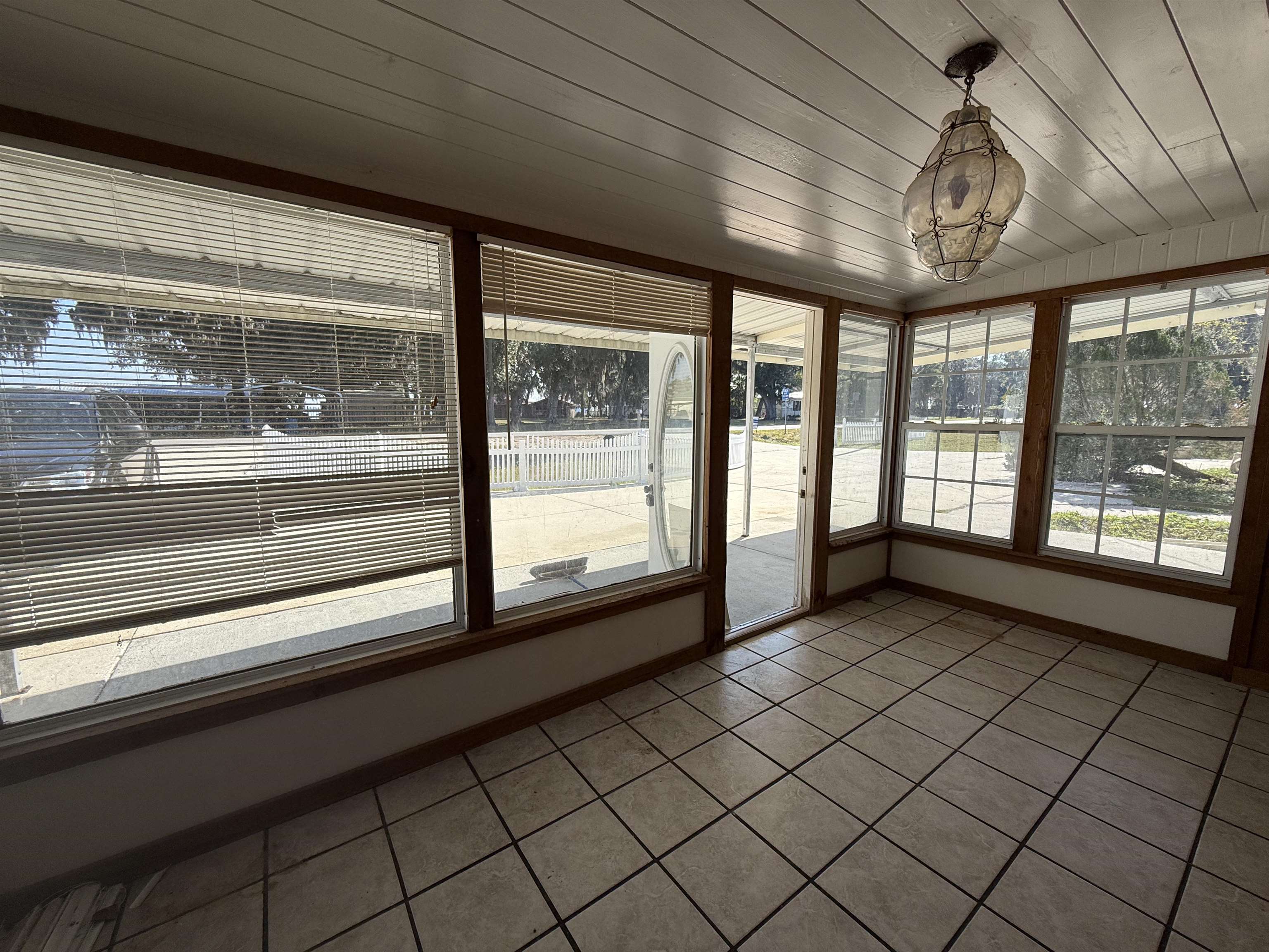 211 Cedar Creek Road Palatka, FL 32177 - Photo 9 of 24 a view of an empty room with a window