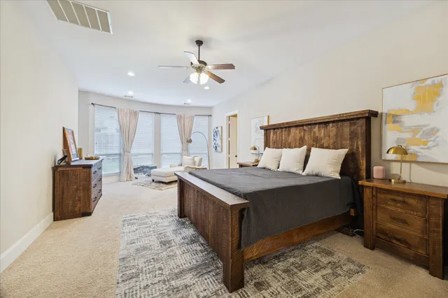 a bed room with a bed and a window