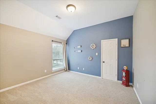 a view of a livingroom with wooden floor and closet