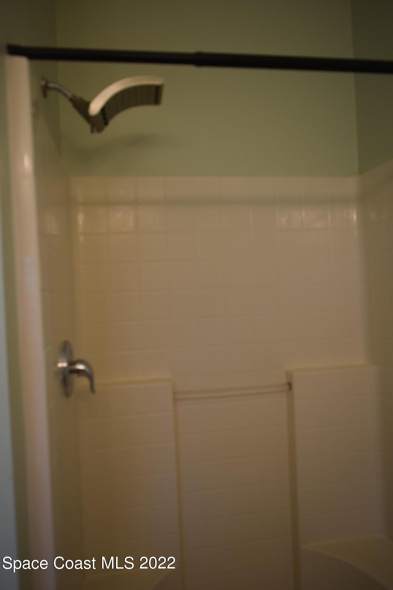 271 Titan Road Southeast Palm Bay, FL 32909 - Photo 12 of 22 a close view of a shower in a bathroom