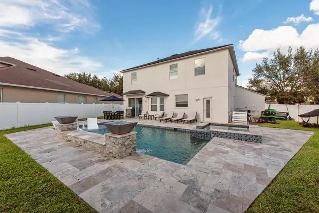 a house view with a outdoor space