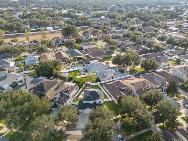 an aerial view of a city with lots of residential buildings