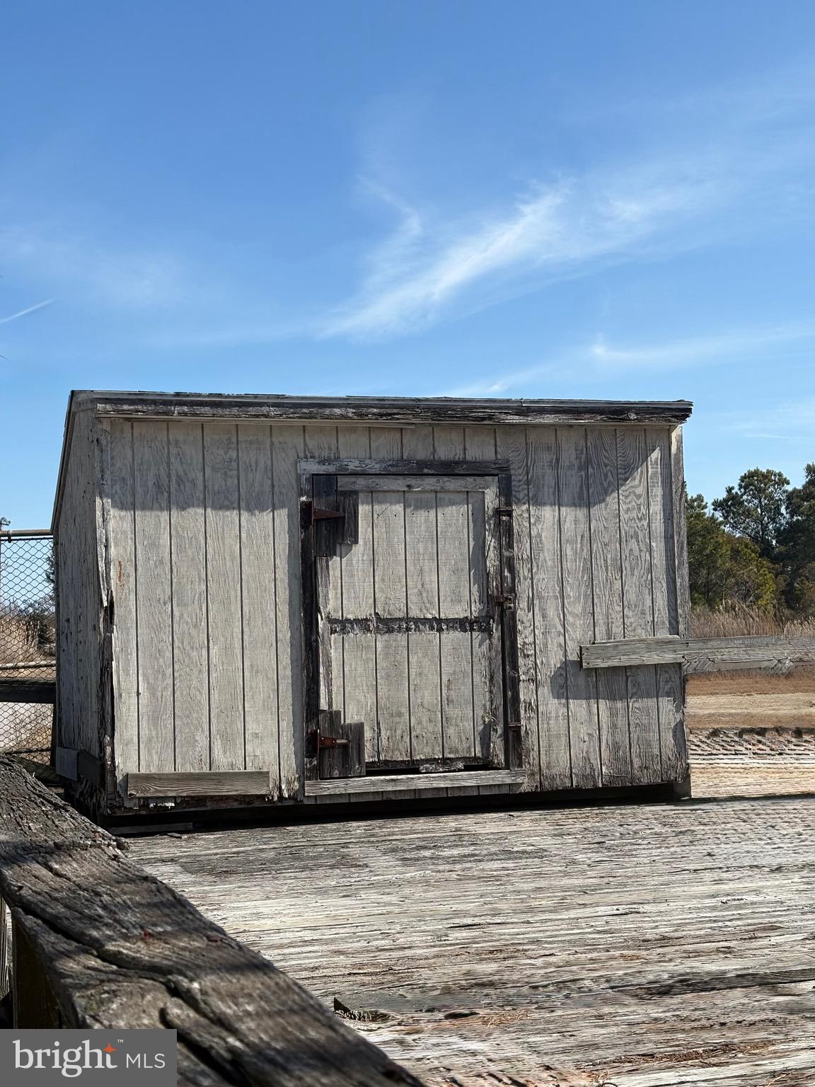 3019 Union Church Road Tylerton, MD 21866 - Photo 12 of 41 a view of a house with wooden fence