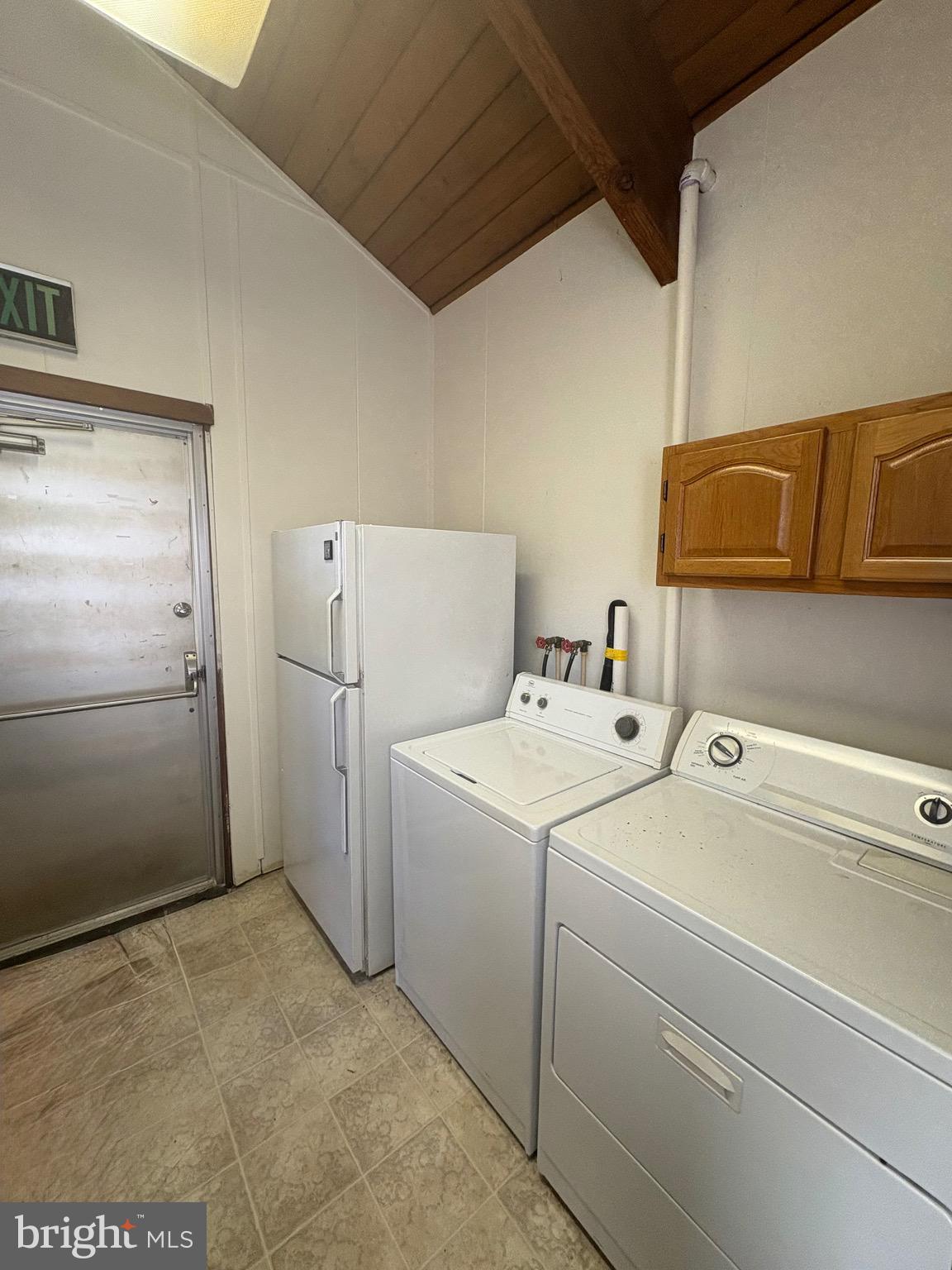 3019 Union Church Road Tylerton, MD 21866 - Photo 20 of 41 a utility room with dryer and washer