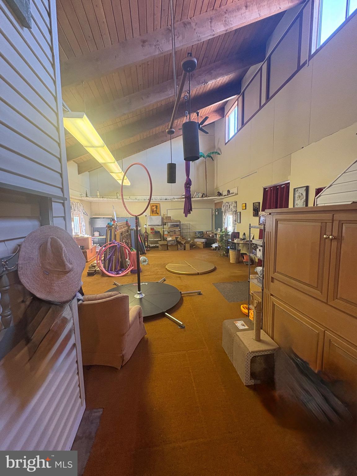 3019 Union Church Road Tylerton, MD 21866 - Photo 24 of 41 a room with lots of wooden furniture and a fireplace