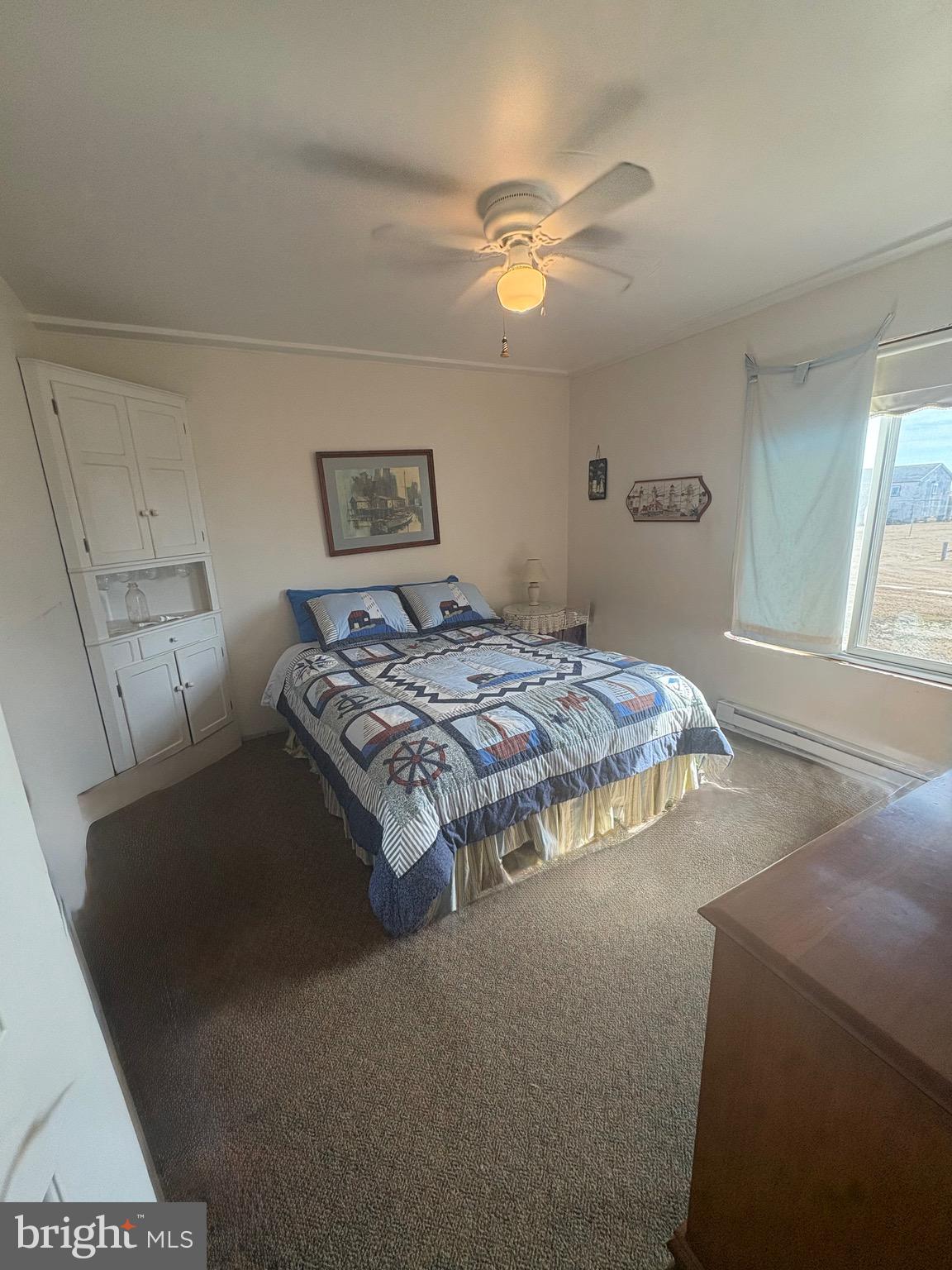 3019 Union Church Road Tylerton, MD 21866 - Photo 27 of 41 a bedroom with a bed and window