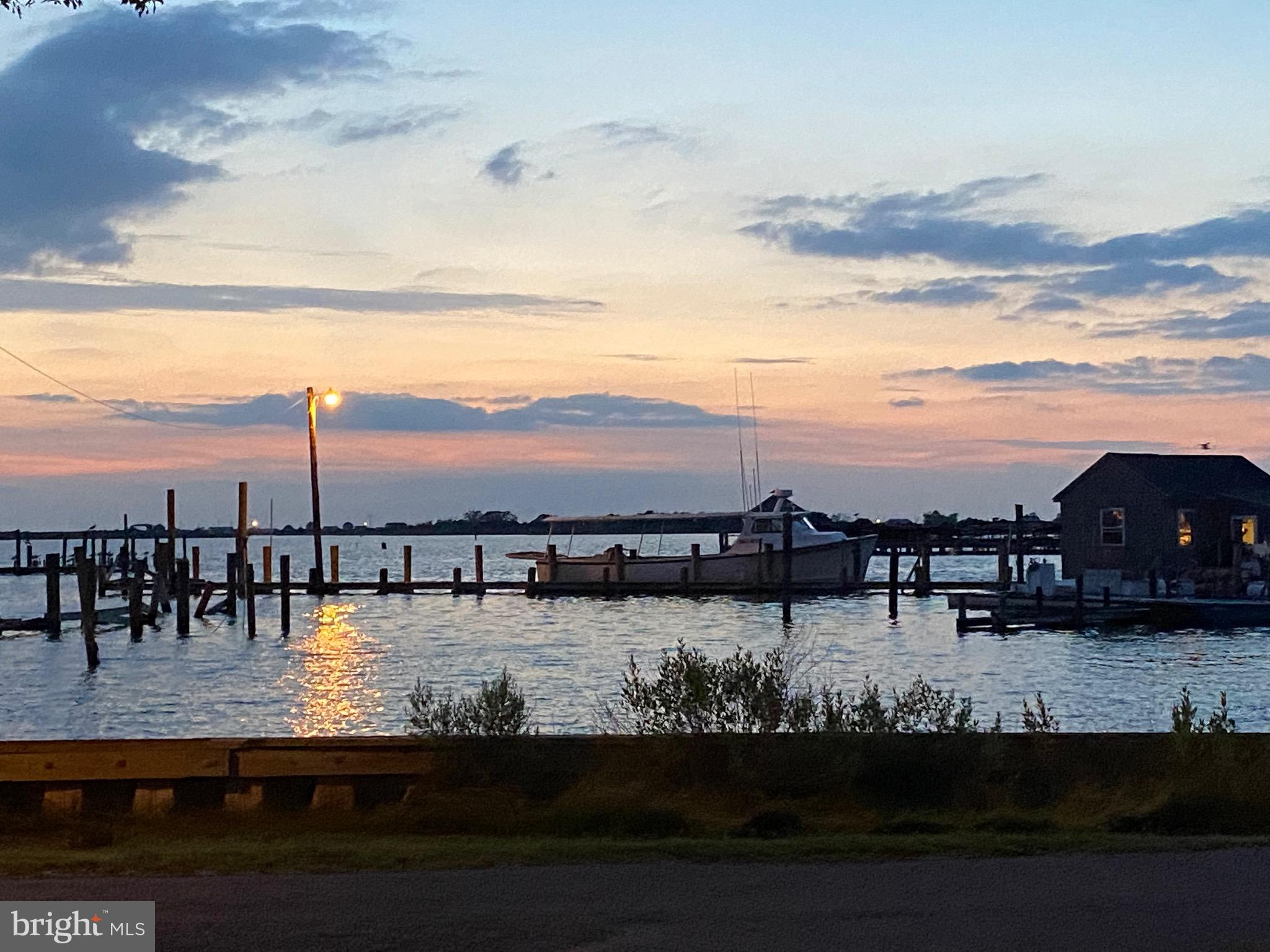 3019 Union Church Road Tylerton, MD 21866 - Photo 39 of 41 a view of a lake with houses in the back