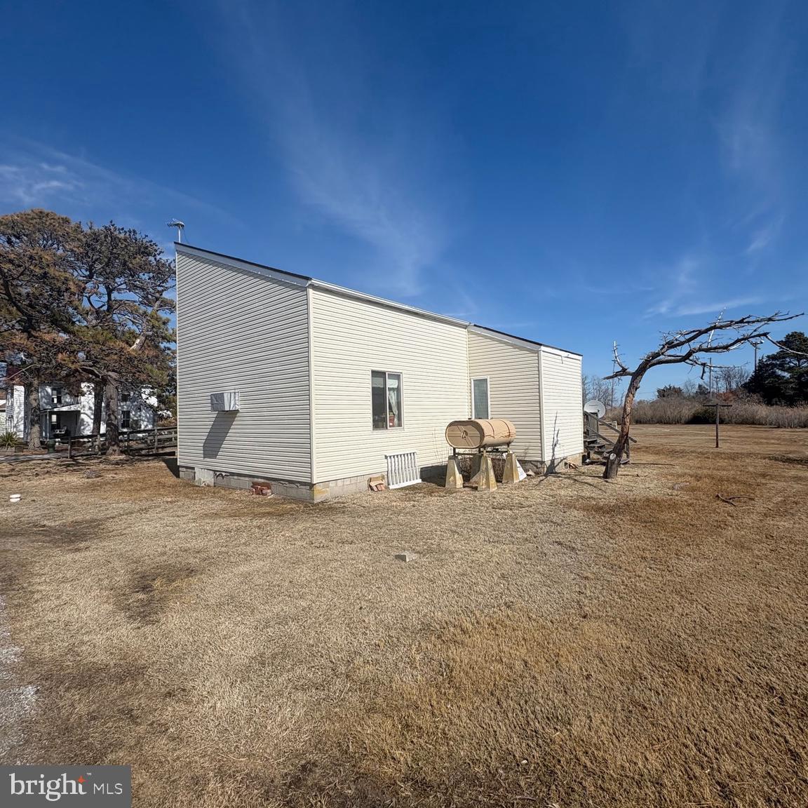 3019 Union Church Road Tylerton, MD 21866 - Photo 8 of 41 a view of a house with a patio