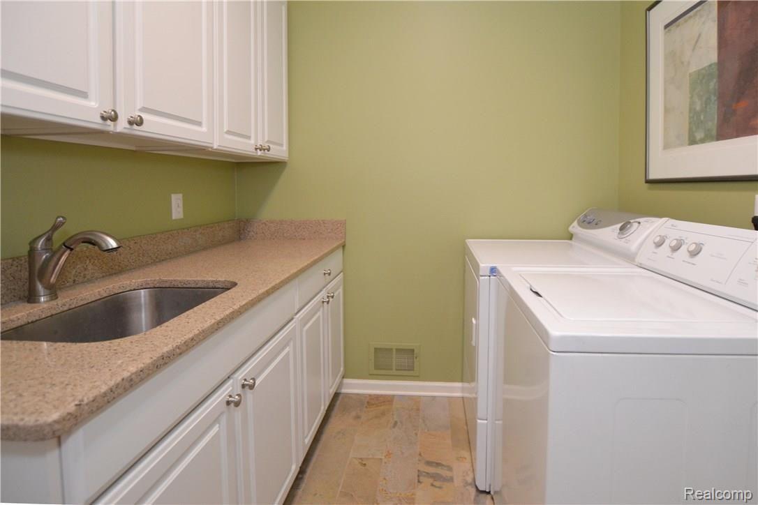 4914 Manchester Court Rochester, MI 48306 - Photo 19 of 35 1st Floor Laundry