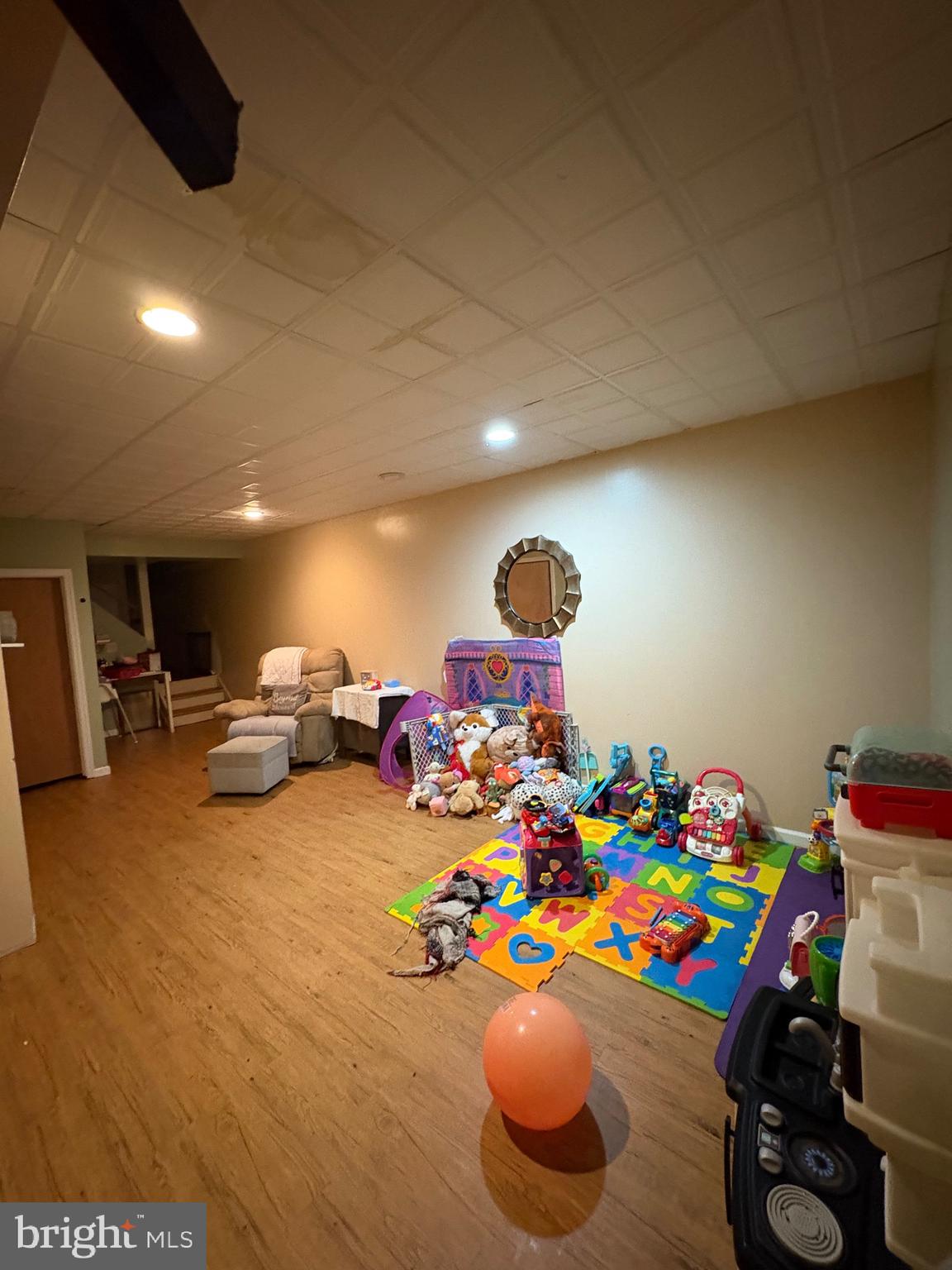 12 Deborah Drive Millville, NJ 08332 - Photo 16 of 52 a playing room with toys and a wooden floor