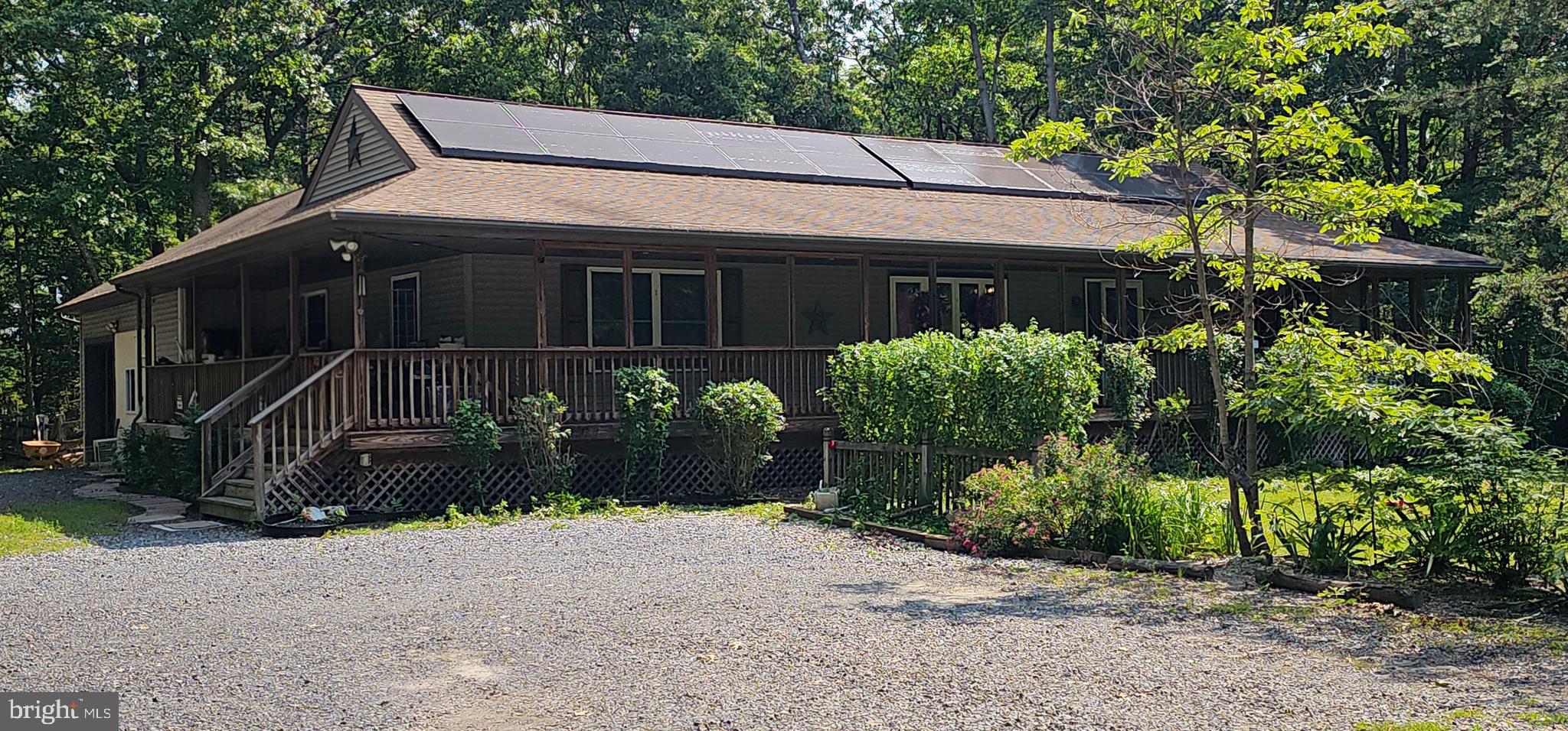12 Deborah Drive Millville, NJ 08332 - Photo 2 of 52 a front view of a house with garden