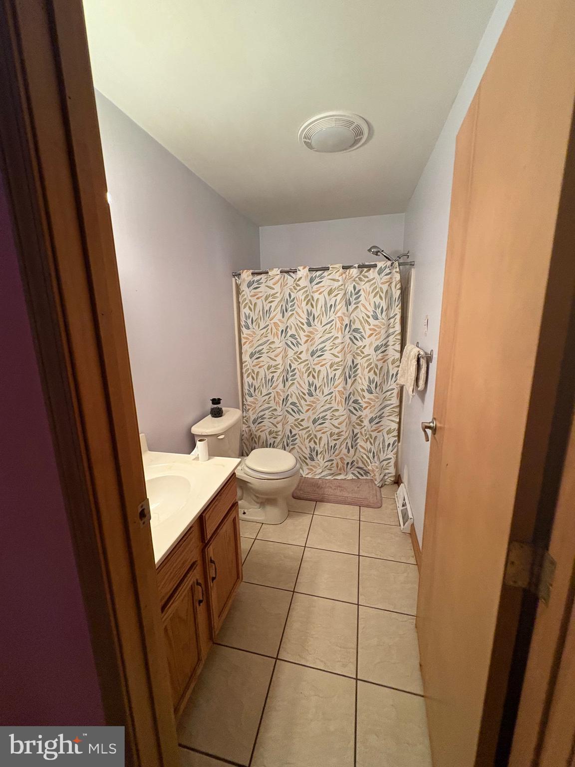 12 Deborah Drive Millville, NJ 08332 - Photo 29 of 52 a bathroom with a sink a toilet and shower