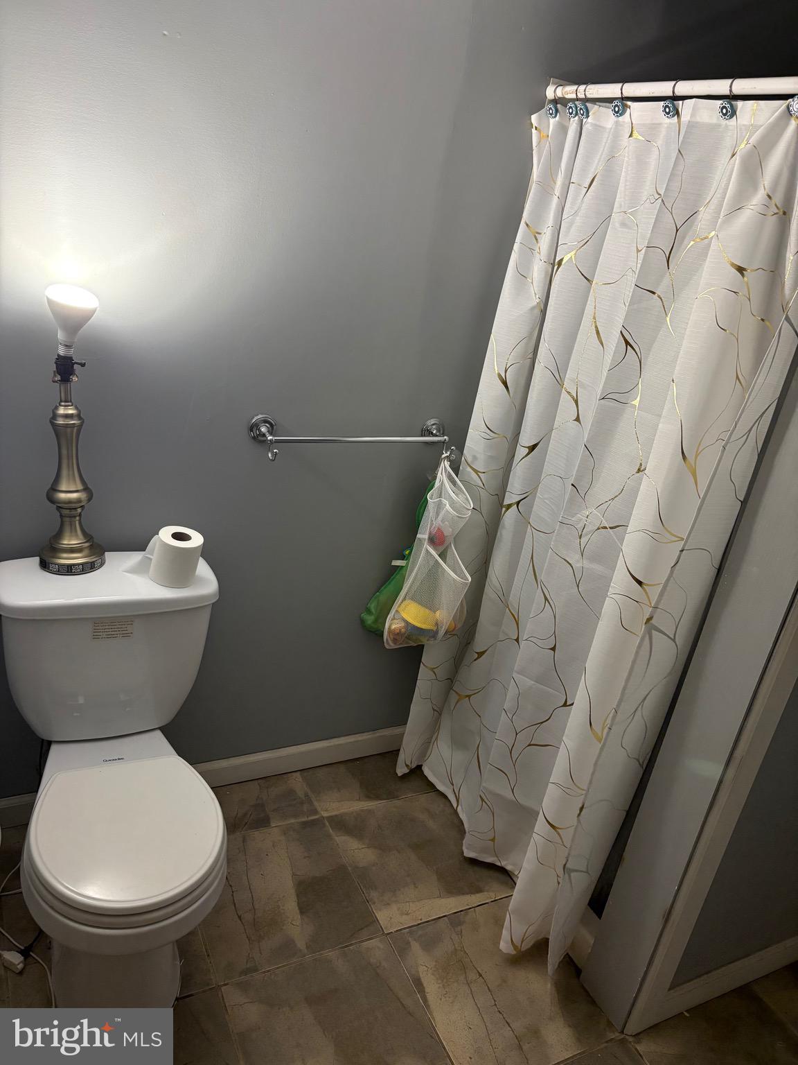 12 Deborah Drive Millville, NJ 08332 - Photo 30 of 52 a bathroom with a toilet and a sink