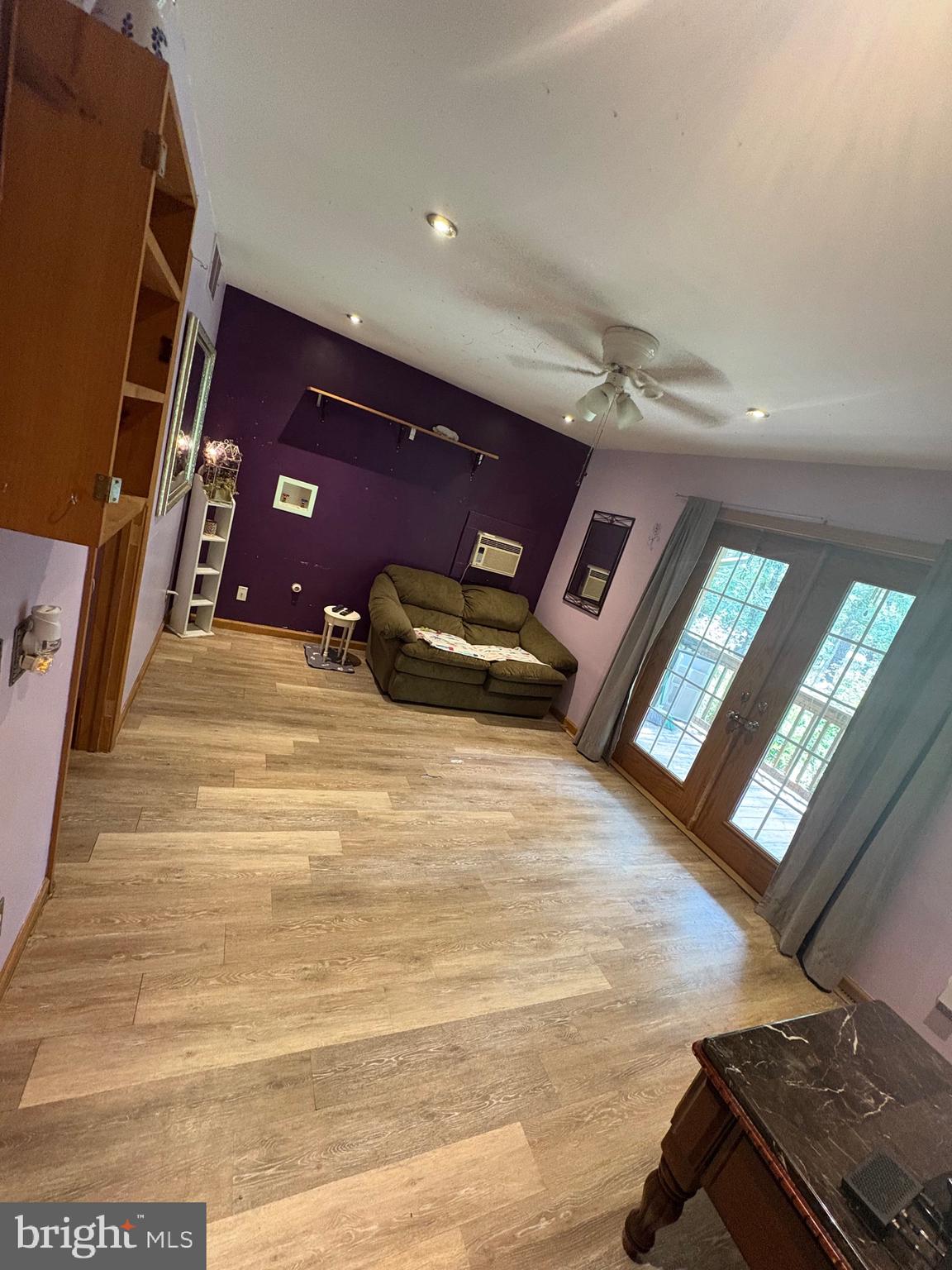 12 Deborah Drive Millville, NJ 08332 - Photo 3 of 52 a view of an empty room with windows