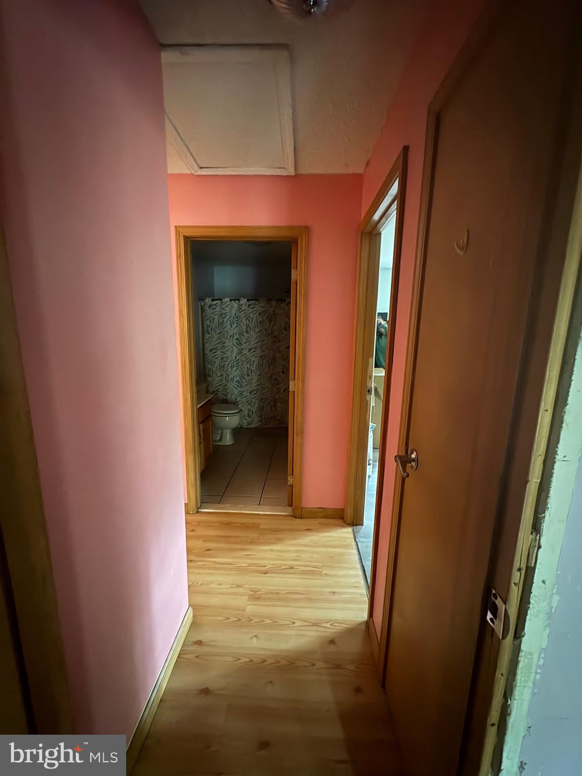12 Deborah Drive Millville, NJ 08332 - Photo 32 of 52 a view of a hallway with wooden floor and a bathroom