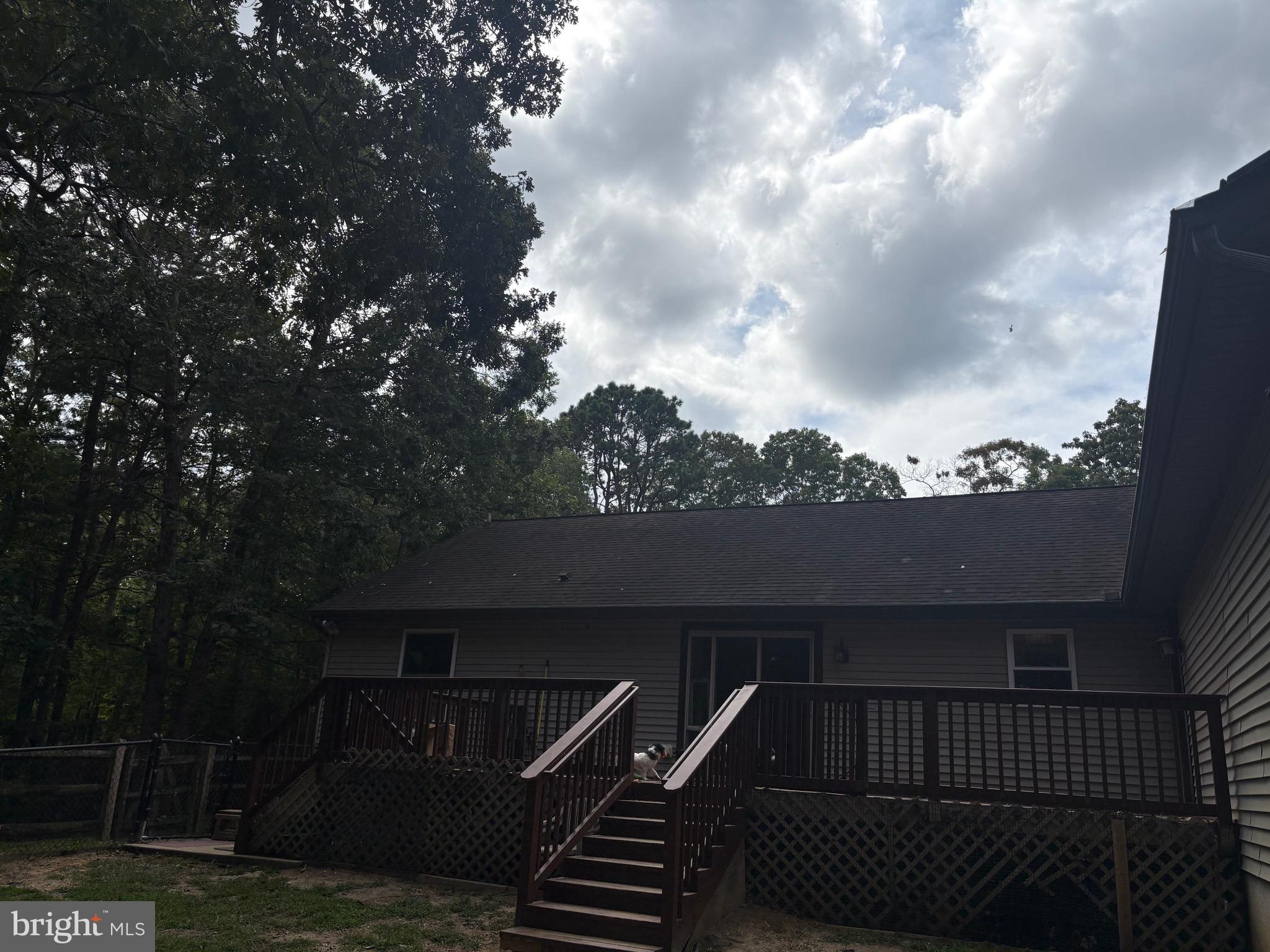 12 Deborah Drive Millville, NJ 08332 - Photo 44 of 52 a view of roof deck with wooden floor and fence