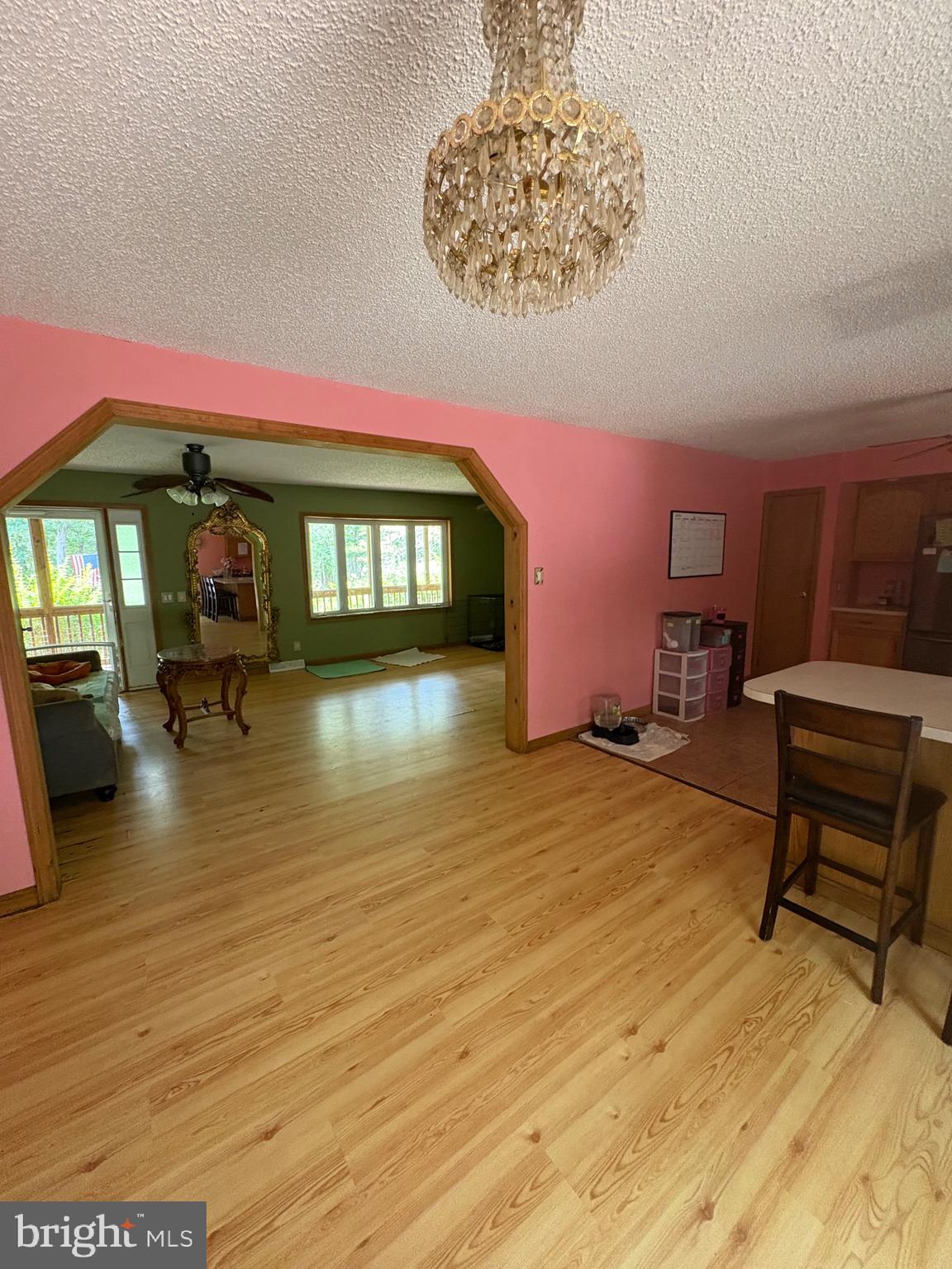 12 Deborah Drive Millville, NJ 08332 - Photo 5 of 52 a living room with furniture and a floor to ceiling window