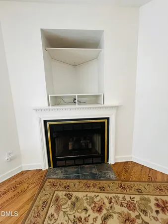 a living room with a fireplace