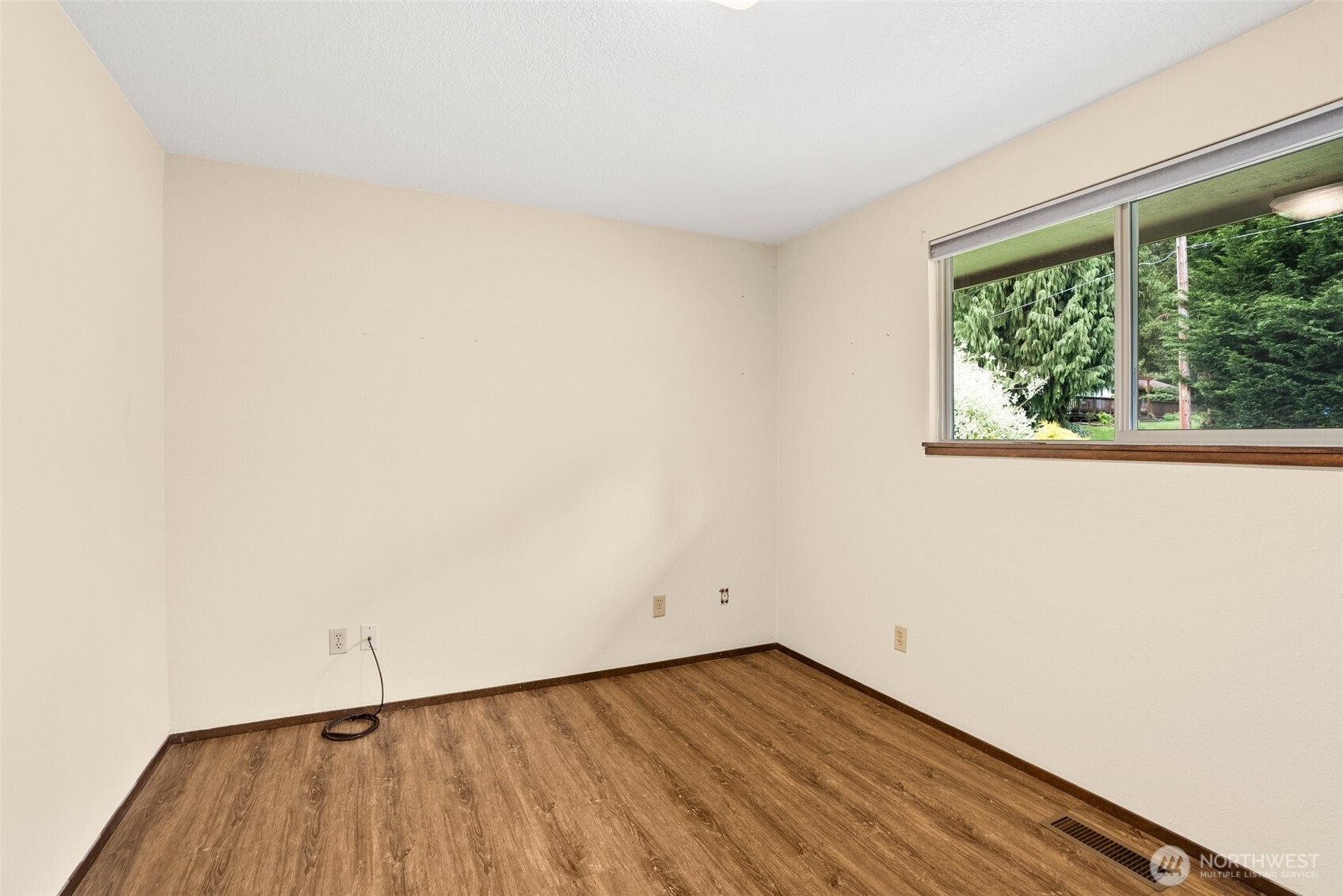 154 Sanderson Road Chehalis, WA 98532 - Photo 14 of 27 an empty room with wooden floor and windows