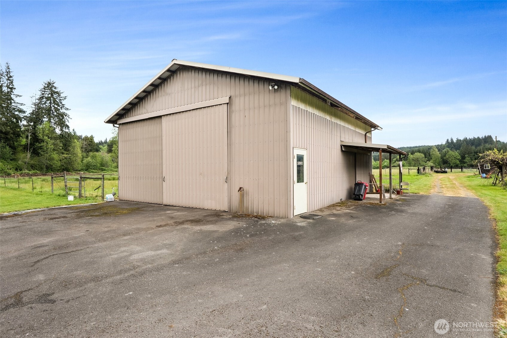 154 Sanderson Road Chehalis, WA 98532 - Photo 18 of 27 a view of a house with a yard and garage