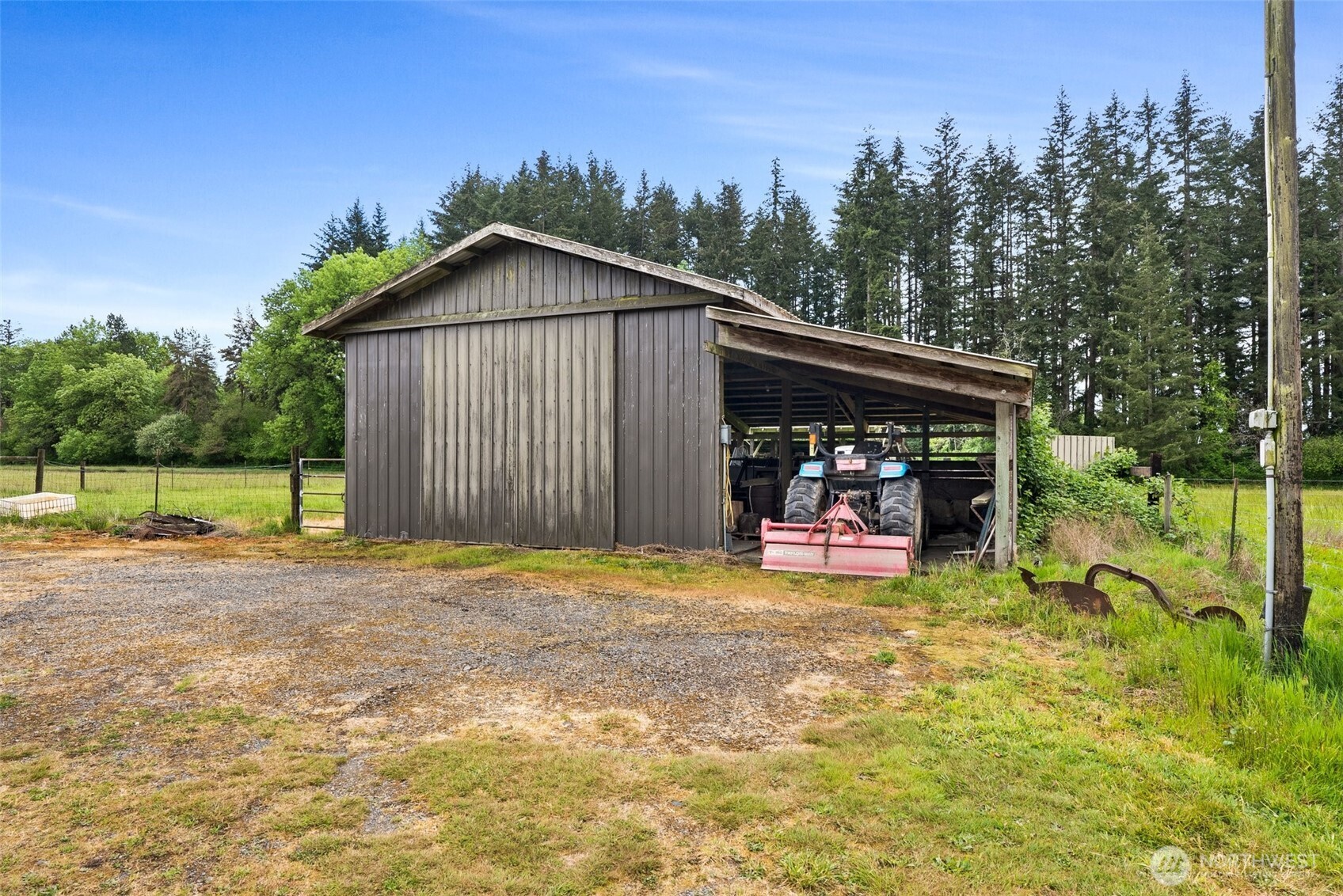 154 Sanderson Road Chehalis, WA 98532 - Photo 20 of 27 a view of a chair and table in the backyard of the house
