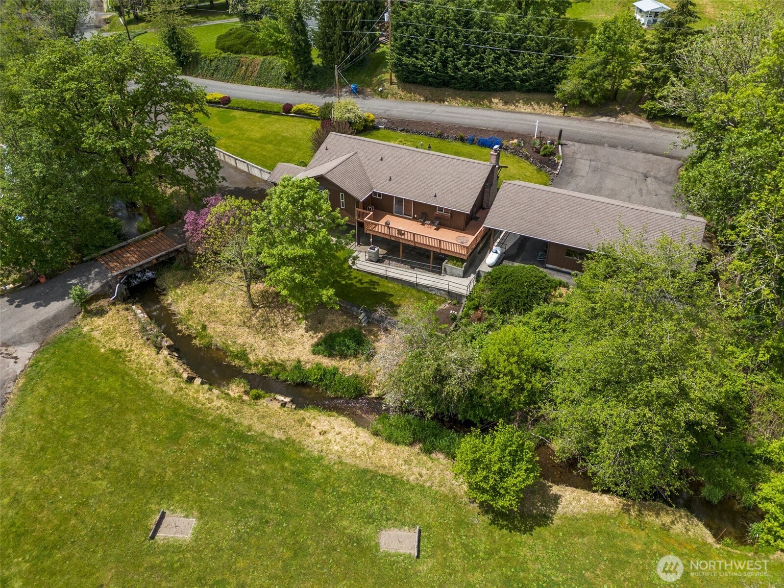 154 Sanderson Road Chehalis, WA 98532 - Photo 7 of 27 a view of a swimming pool with a patio