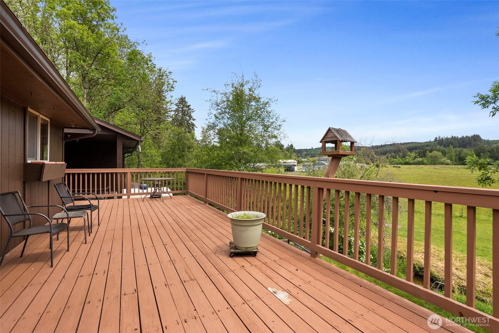 154 Sanderson Road Chehalis, WA 98532 - Photo 9 of 27 a view of a balcony with wooden floor and fence
