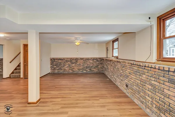 a view of a livingroom with wooden floor