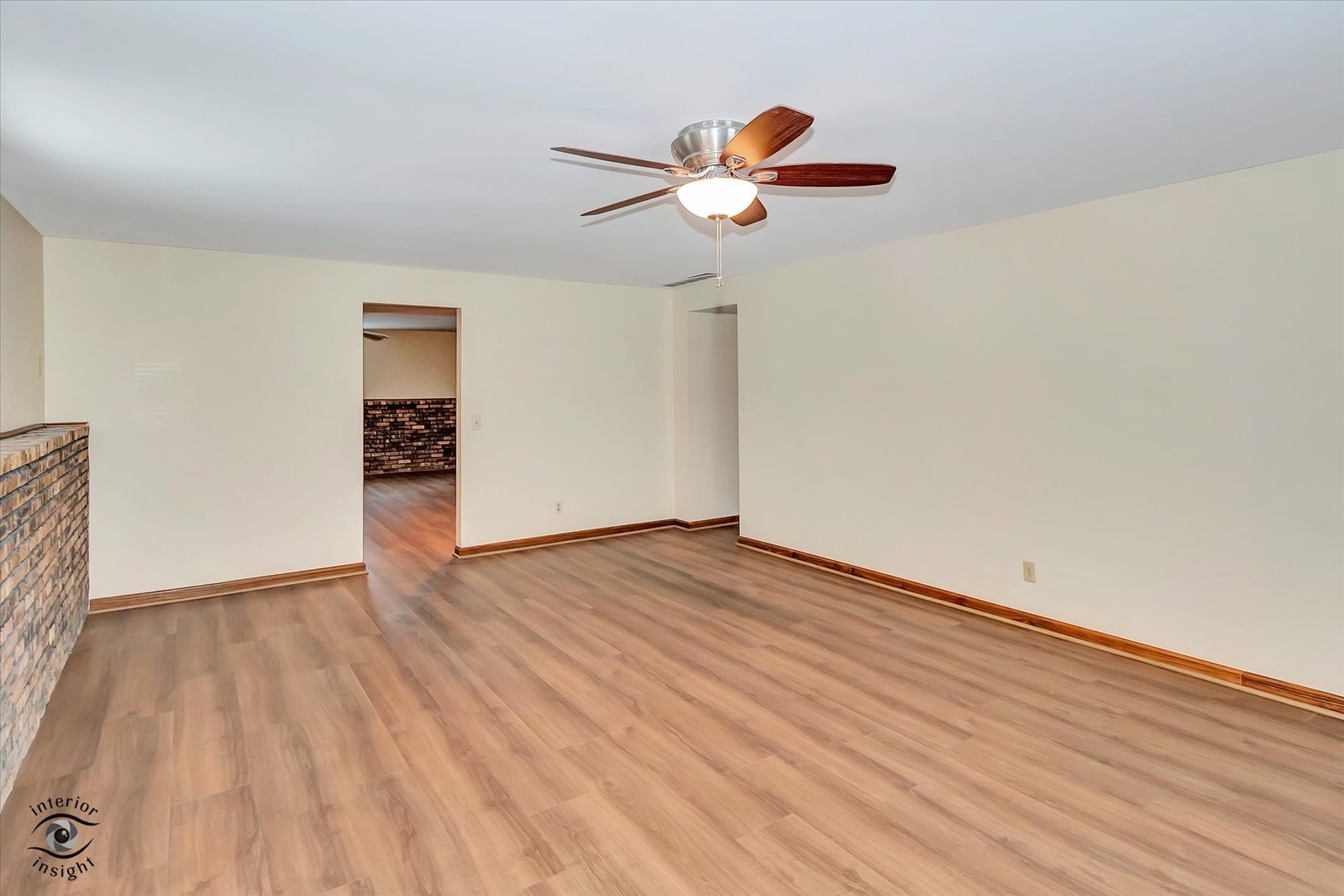9 Cebold Drive Montgomery, IL 60538 - Photo 21 of 30 wooden floor in an empty room with a window