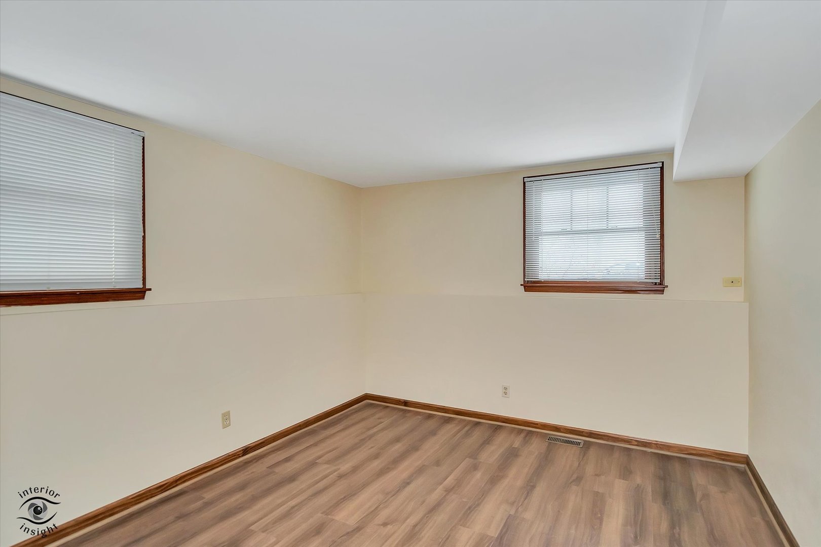 9 Cebold Drive Montgomery, IL 60538 - Photo 23 of 30 a view of an empty room with wooden floor and a window