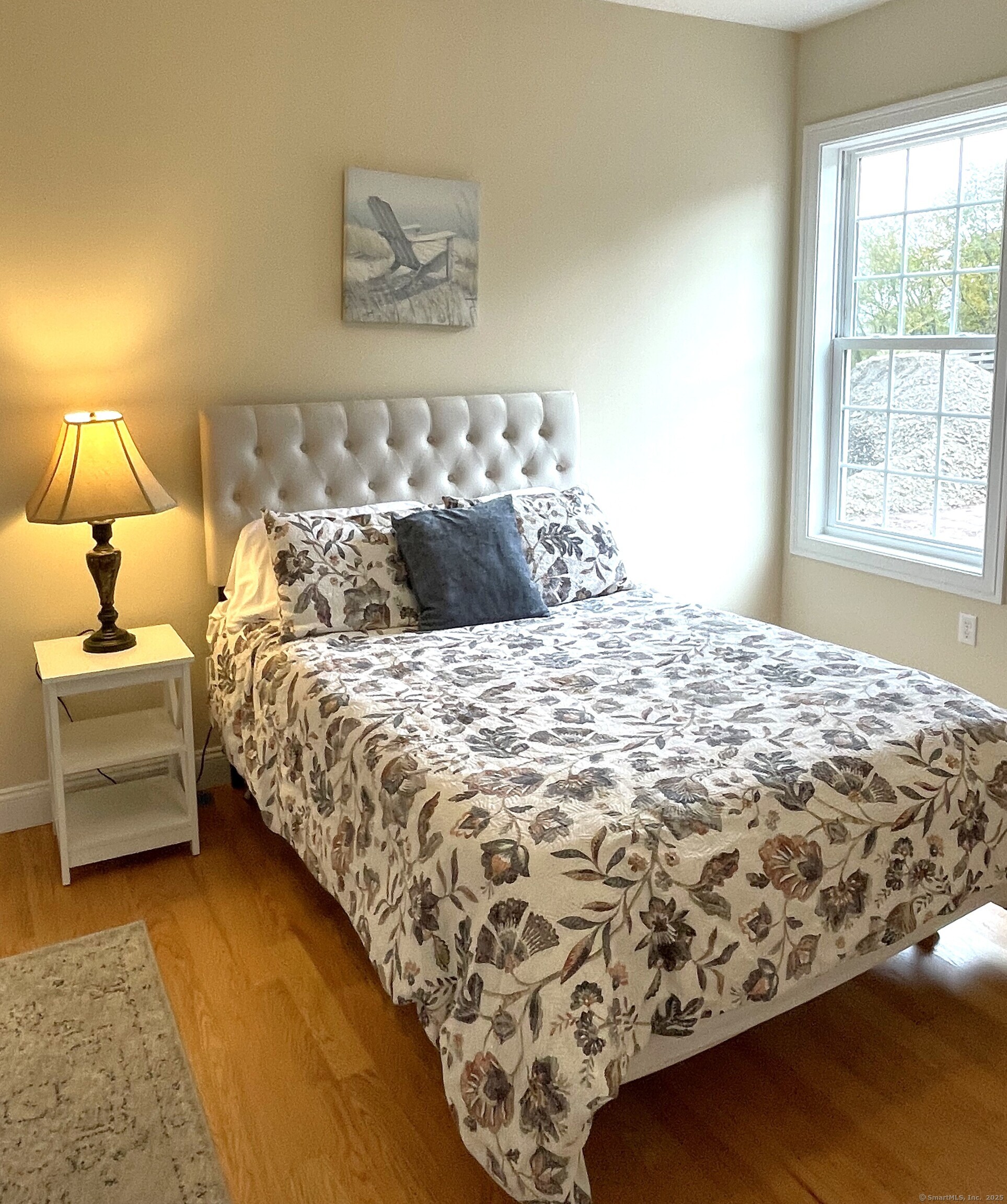 145 Webster Lane, Unit 241 Middletown, CT 06457 - Photo 16 of 22 a bedroom with a bed and a window