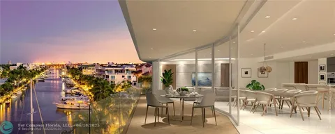 a view of a terrace with couches and city view