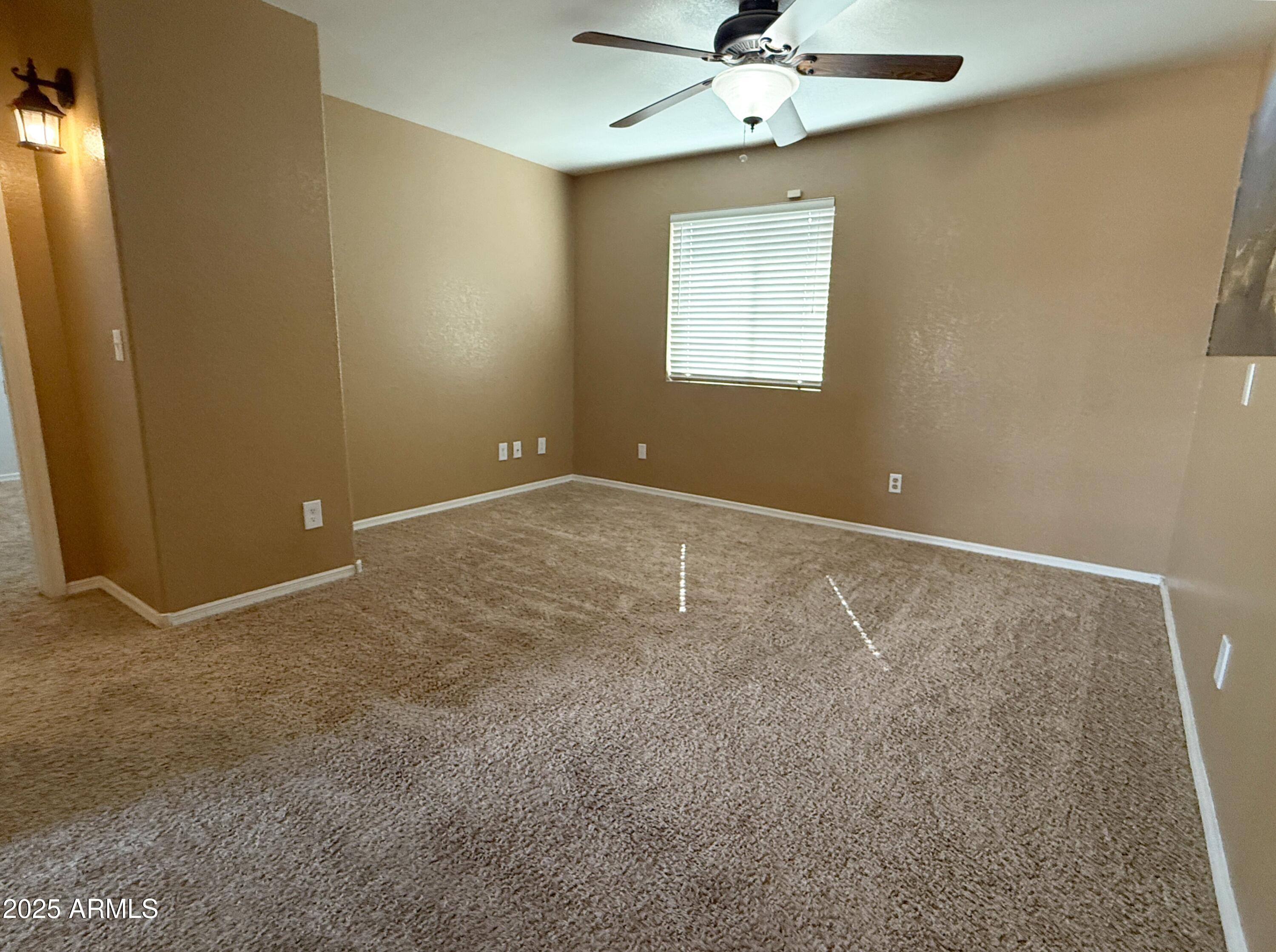 1670 East Gary Drive Chandler, AZ 85225 - Photo 12 of 34 a view of an empty room with a window