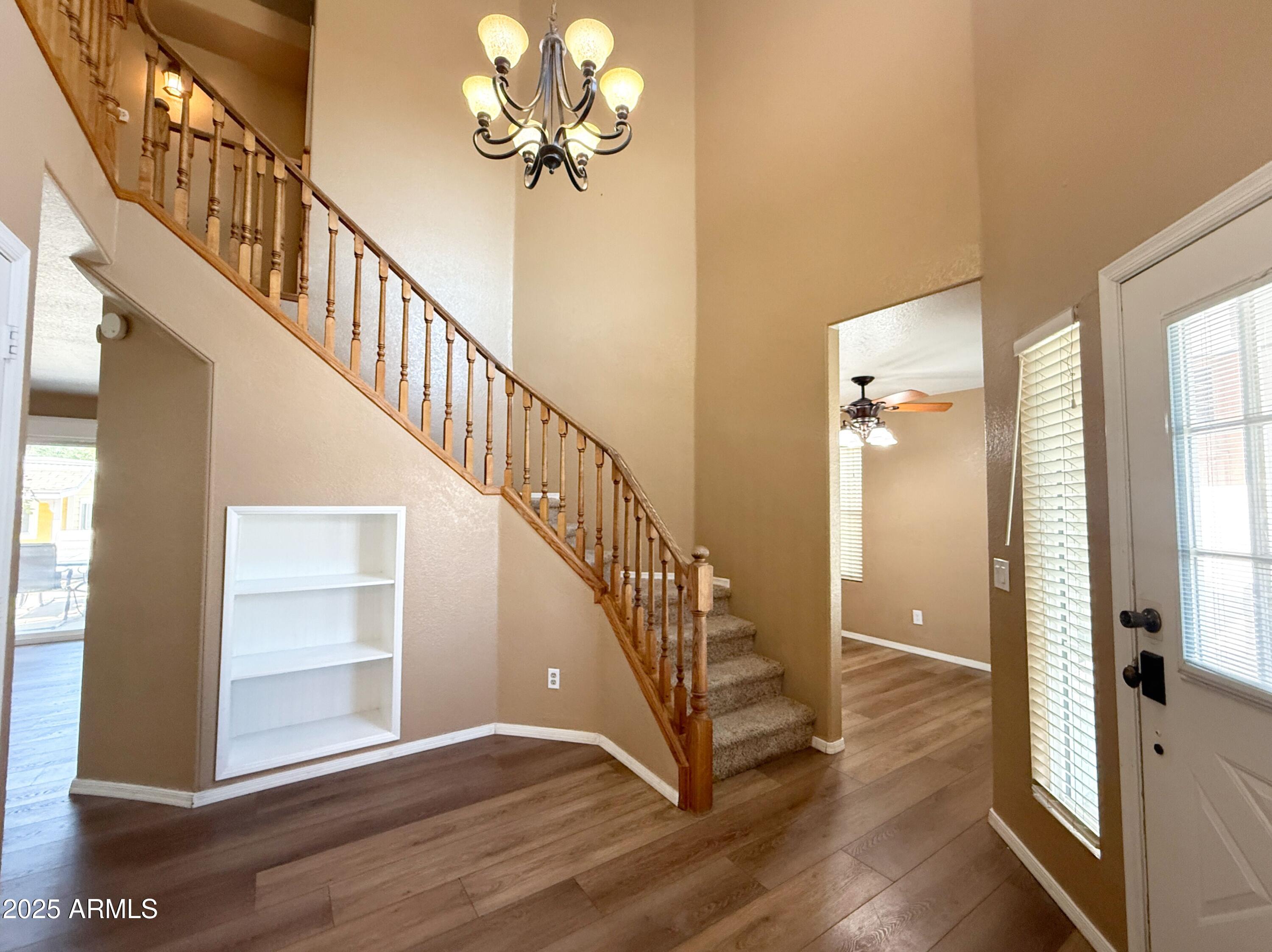 1670 East Gary Drive Chandler, AZ 85225 - Photo 2 of 34 a view of entryway and hall with wooden floor