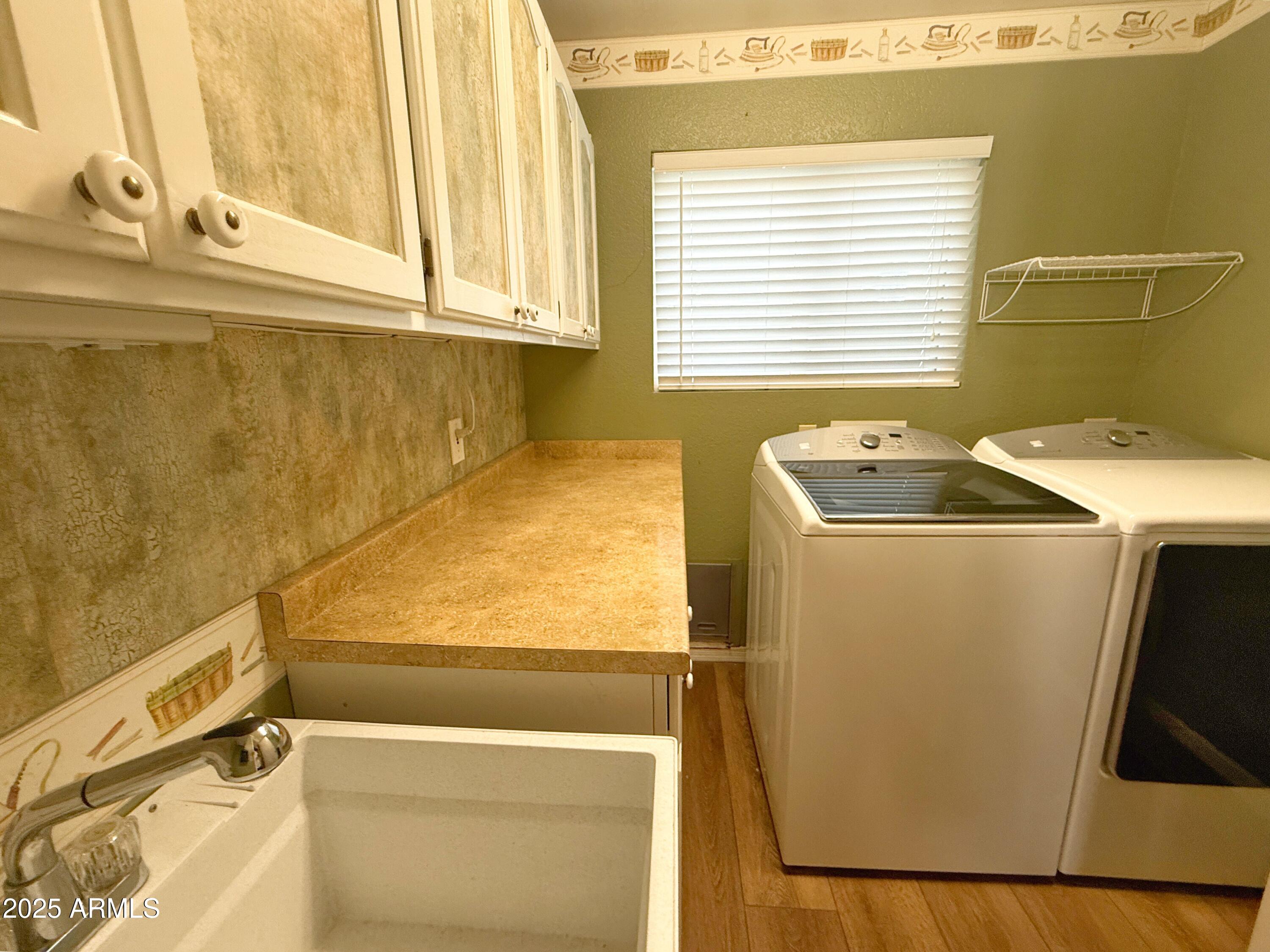 1670 East Gary Drive Chandler, AZ 85225 - Photo 30 of 34 a utility room with dryer and washer