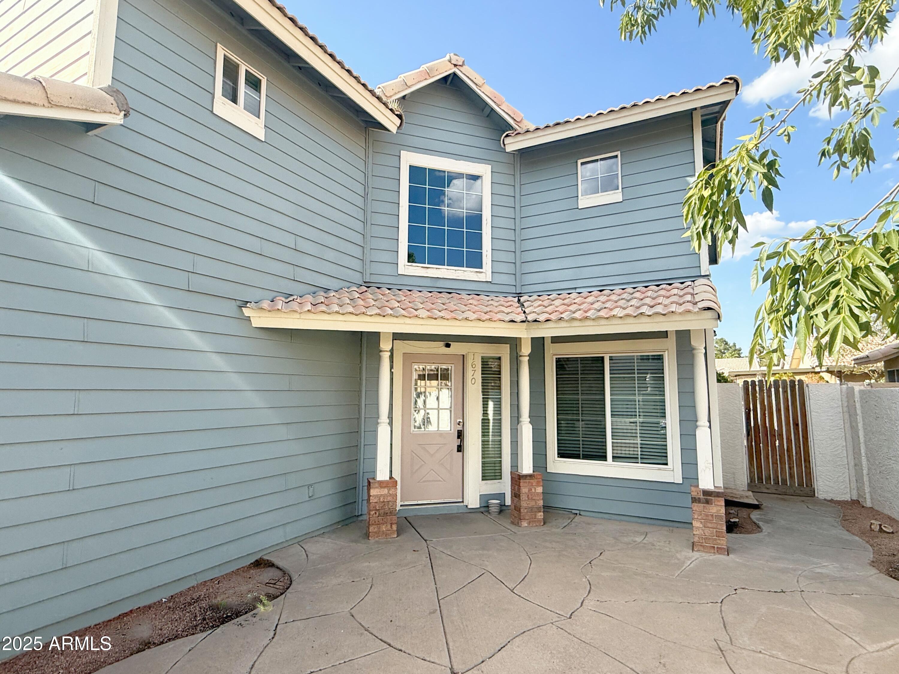 1670 East Gary Drive Chandler, AZ 85225 - Photo 34 of 34 a view of a house with a small space and a large window