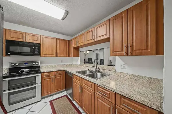 $209,500 | 15244 Lakes Of Delray Boulevard, Unit 103, Delray Beach, FL 33484