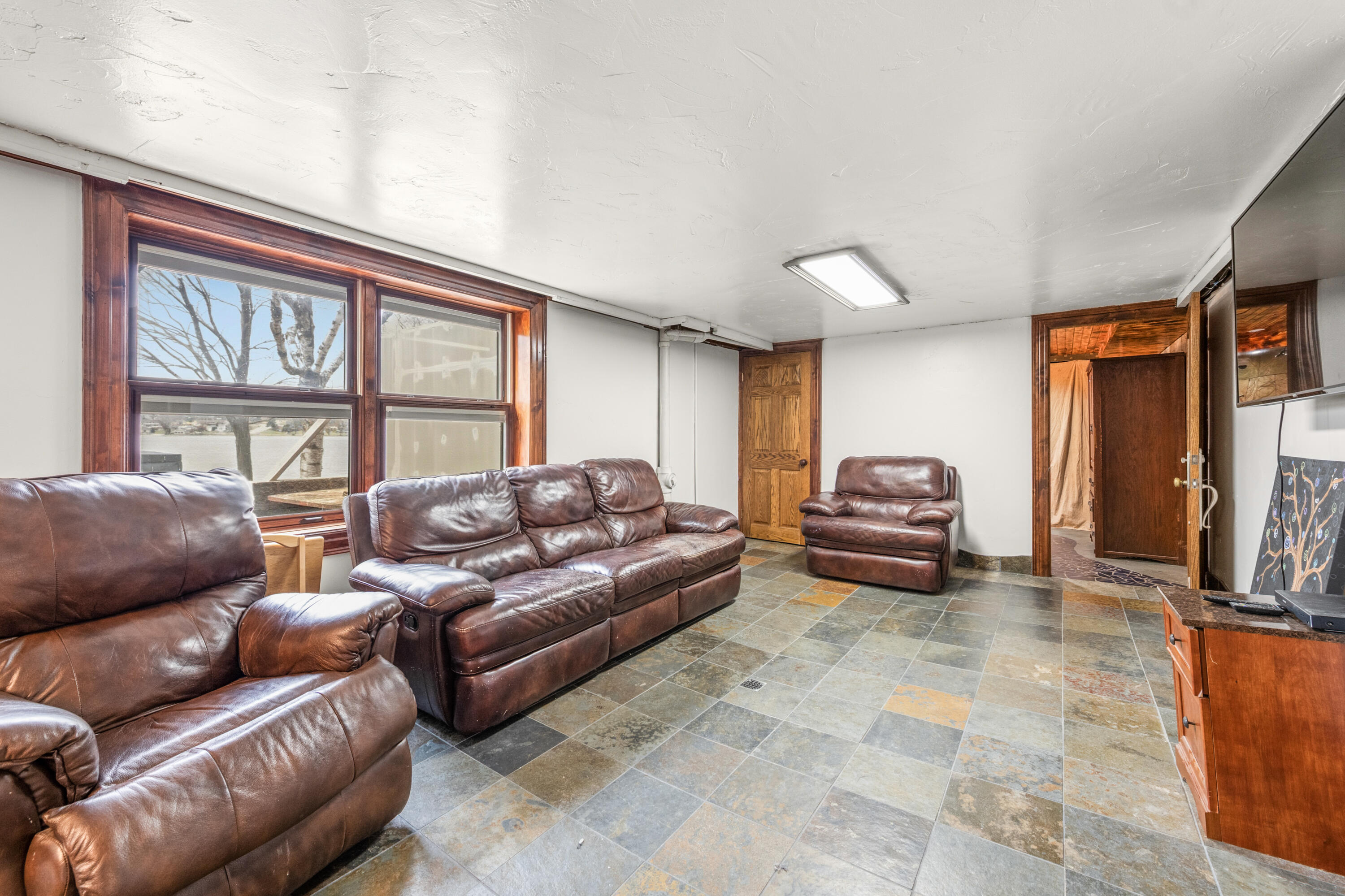 151 East Shore Drive Random Lake, WI 53075 - Photo 29 of 65 Rec Room / Living Room