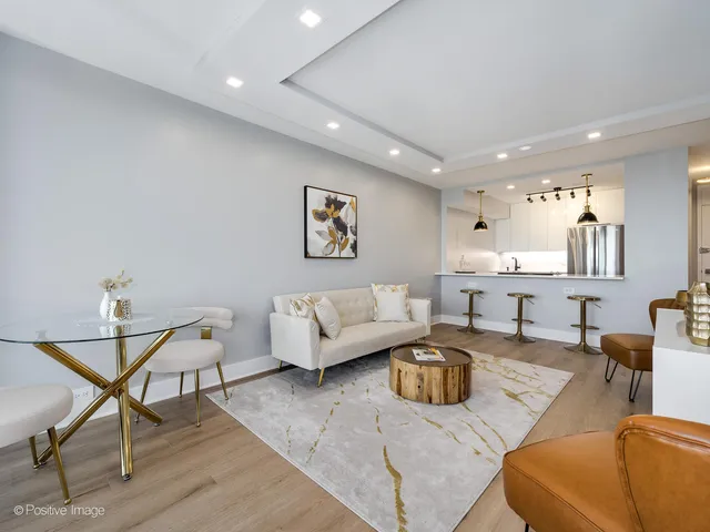 a living room with furniture and a couch