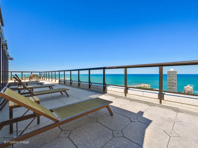 a view of a balcony with an ocean view