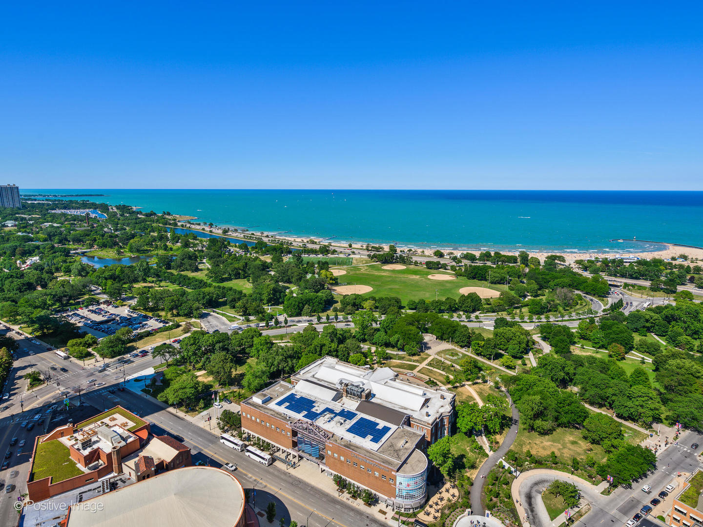 1560 North Sandburg Terrace, Unit 2403J Chicago, IL 60610 - Photo 30 of 45 an aerial view of a city with lots of residential buildings