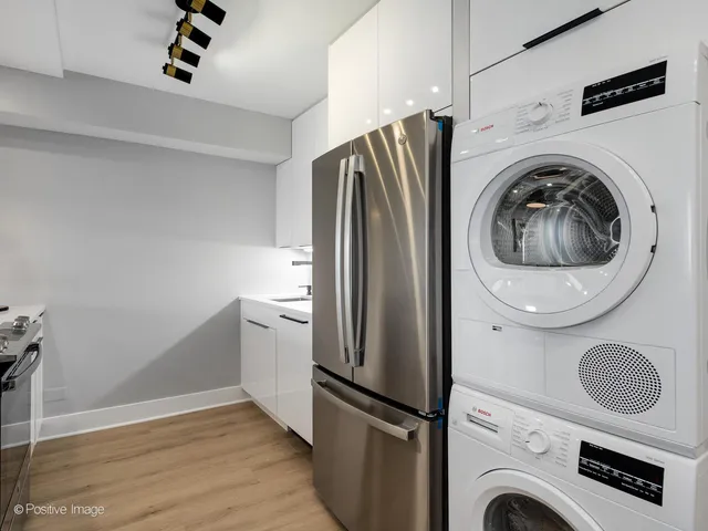 a view of kitchen and washer and dryer