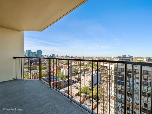 a view of balcony with city