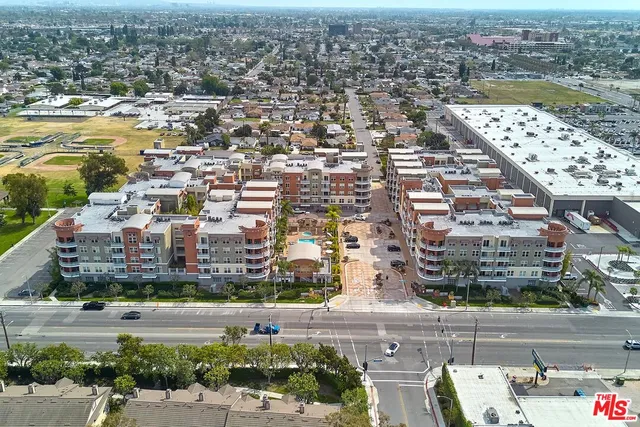 an aerial view of residential building and lake view