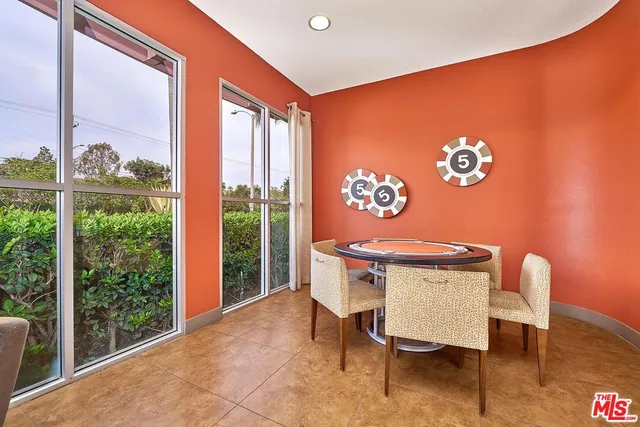 a workspace with furniture and window