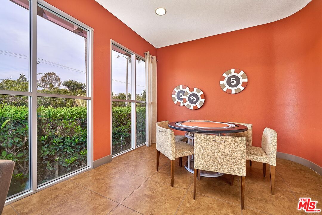 12664 Chapman Avenue, Unit 1208 Garden Grove, CA 92840 - Photo 25 of 29 a workspace with furniture and window