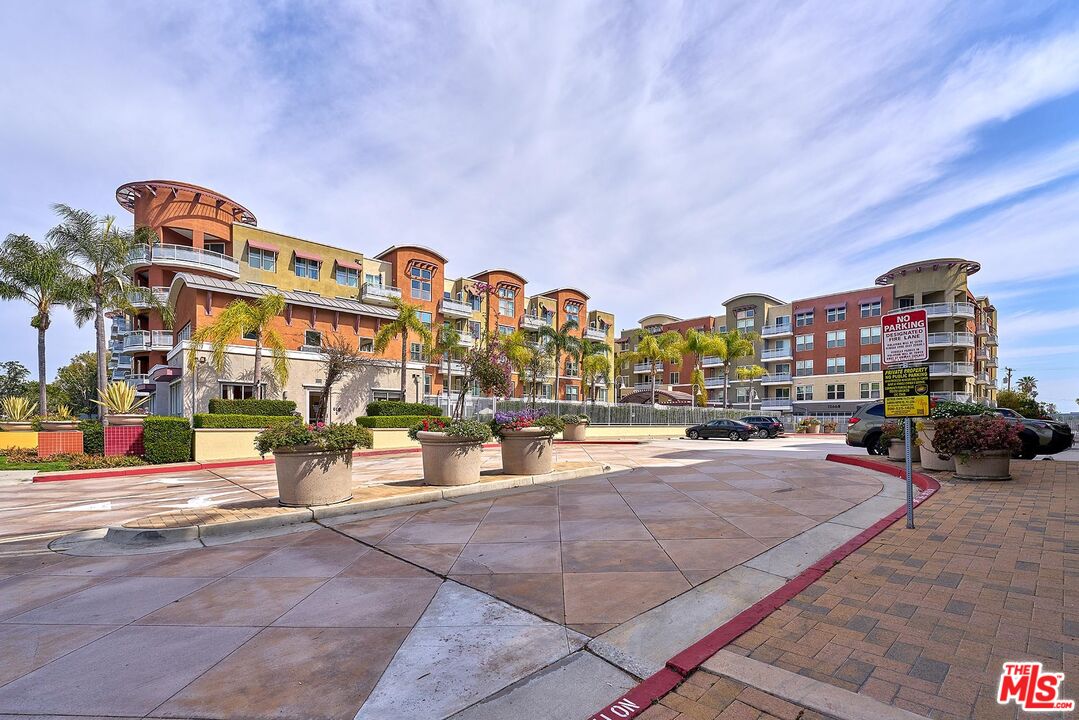 12664 Chapman Avenue, Unit 1208 Garden Grove, CA 92840 - Photo 29 of 29 a building with outdoor space