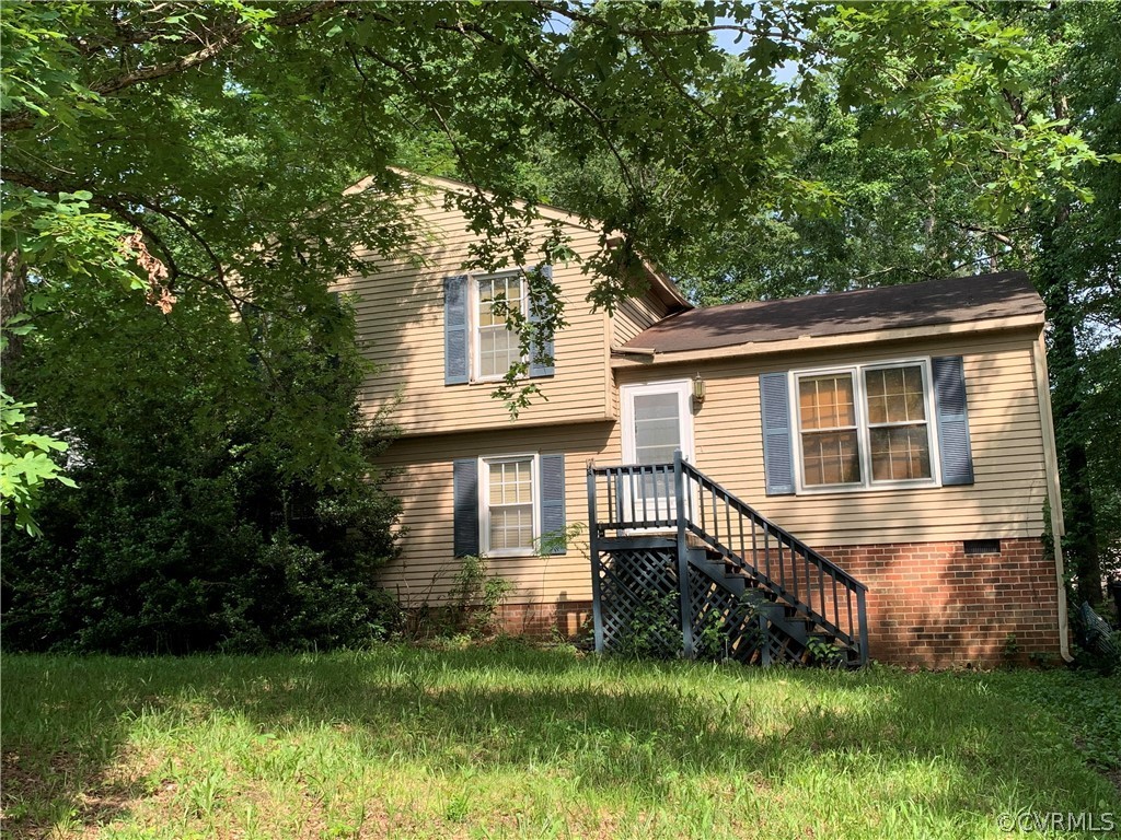 4811 Alberta Road Chesterfield, VA 23832 - Photo 2 of 2 a front view of a house with a yard