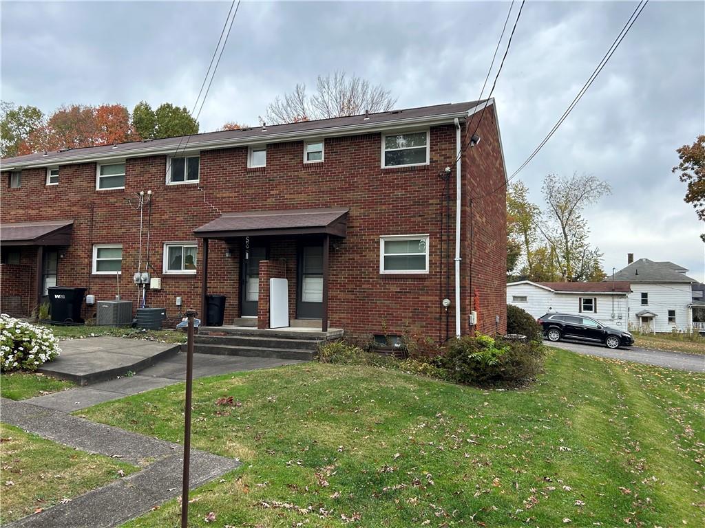 330B Moon Clinton Road, Unit A Coraopolis, PA 15108 - Photo 13 of 18 a front view of a house with a yard